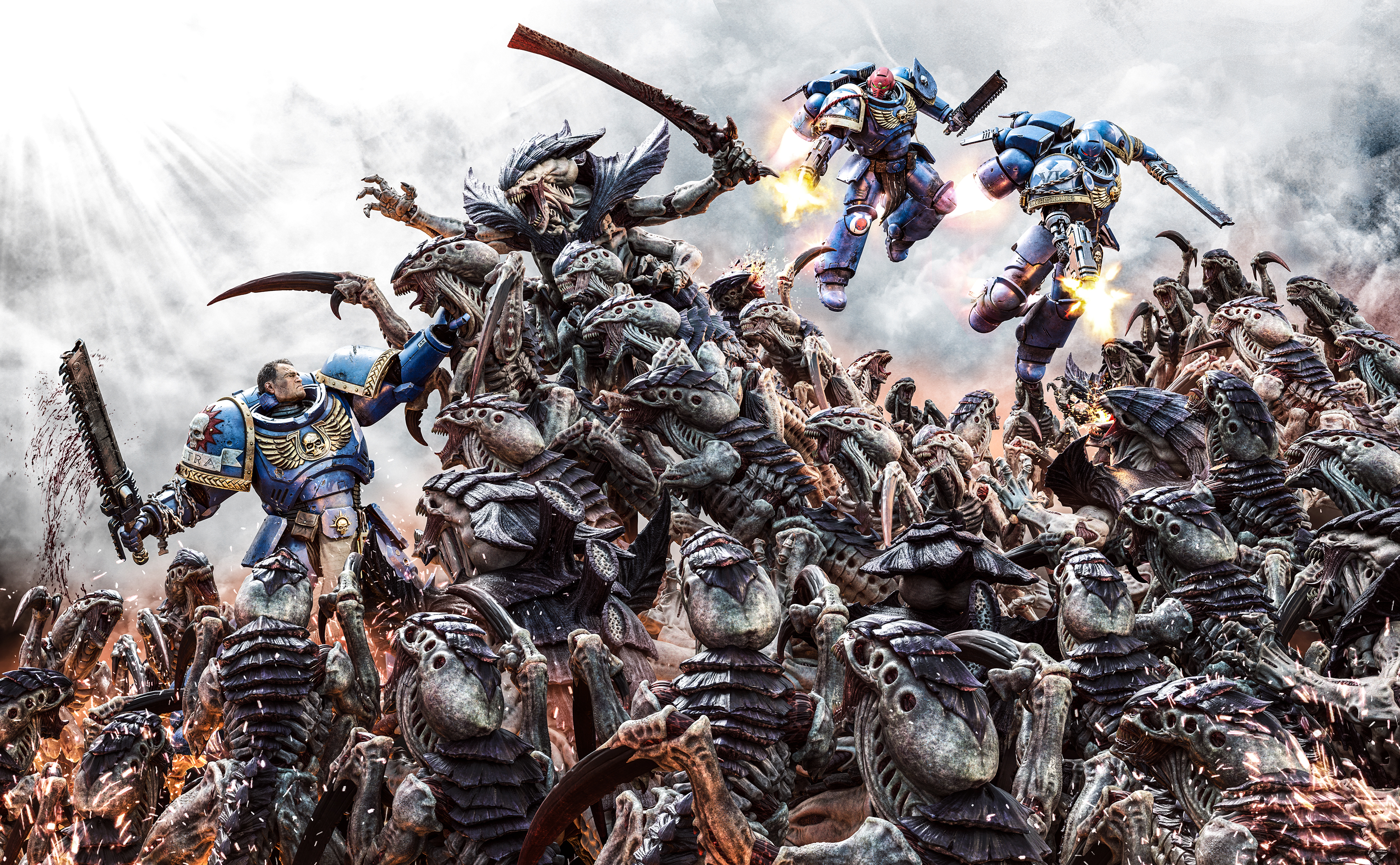 Key art for Space Marine 2, showing Titus and two Ultramarines fighting their way through a pile of the insectoid alien Tyranid.