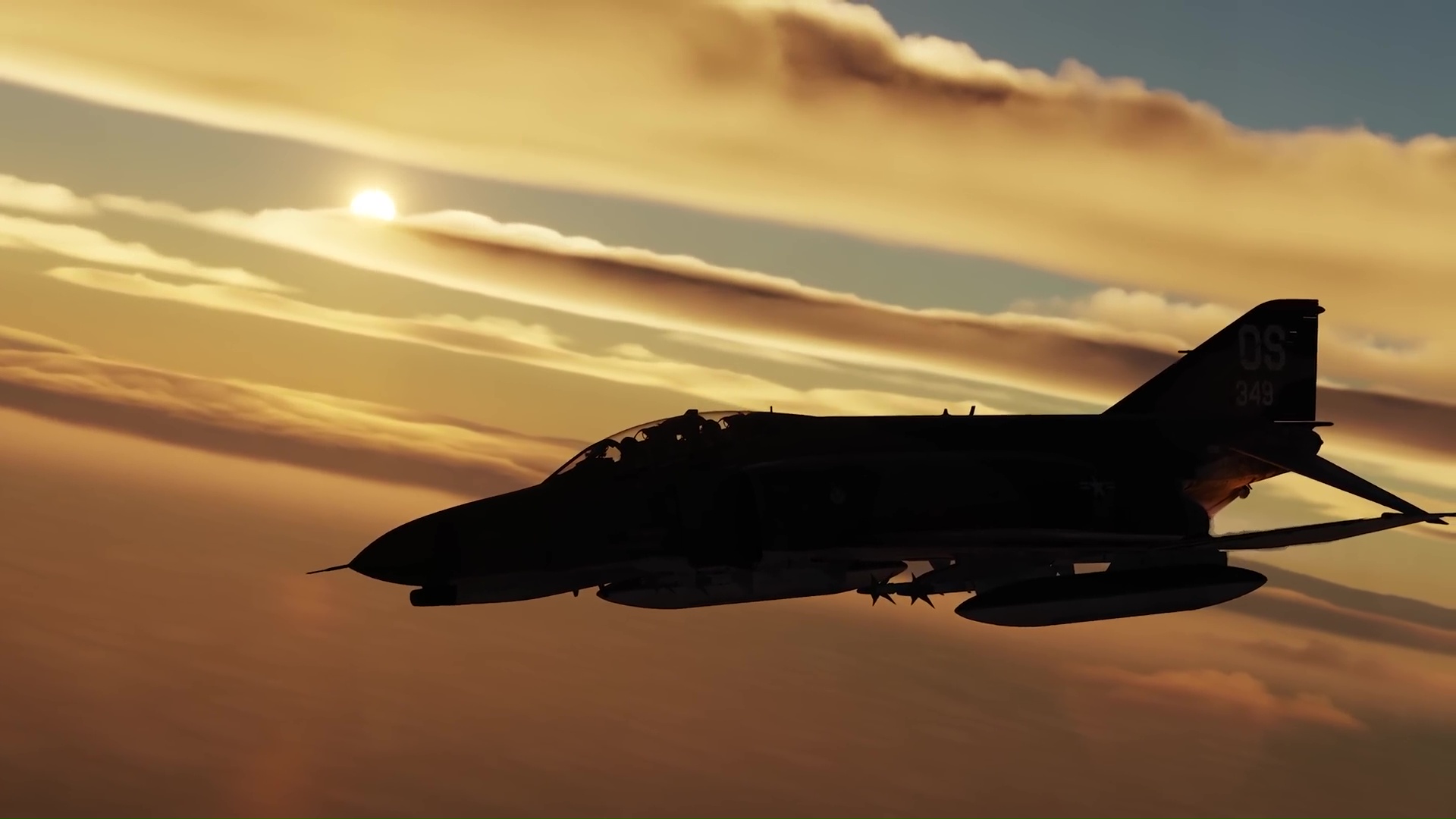 An F-4 Phantom silhouetted against a setting sun.