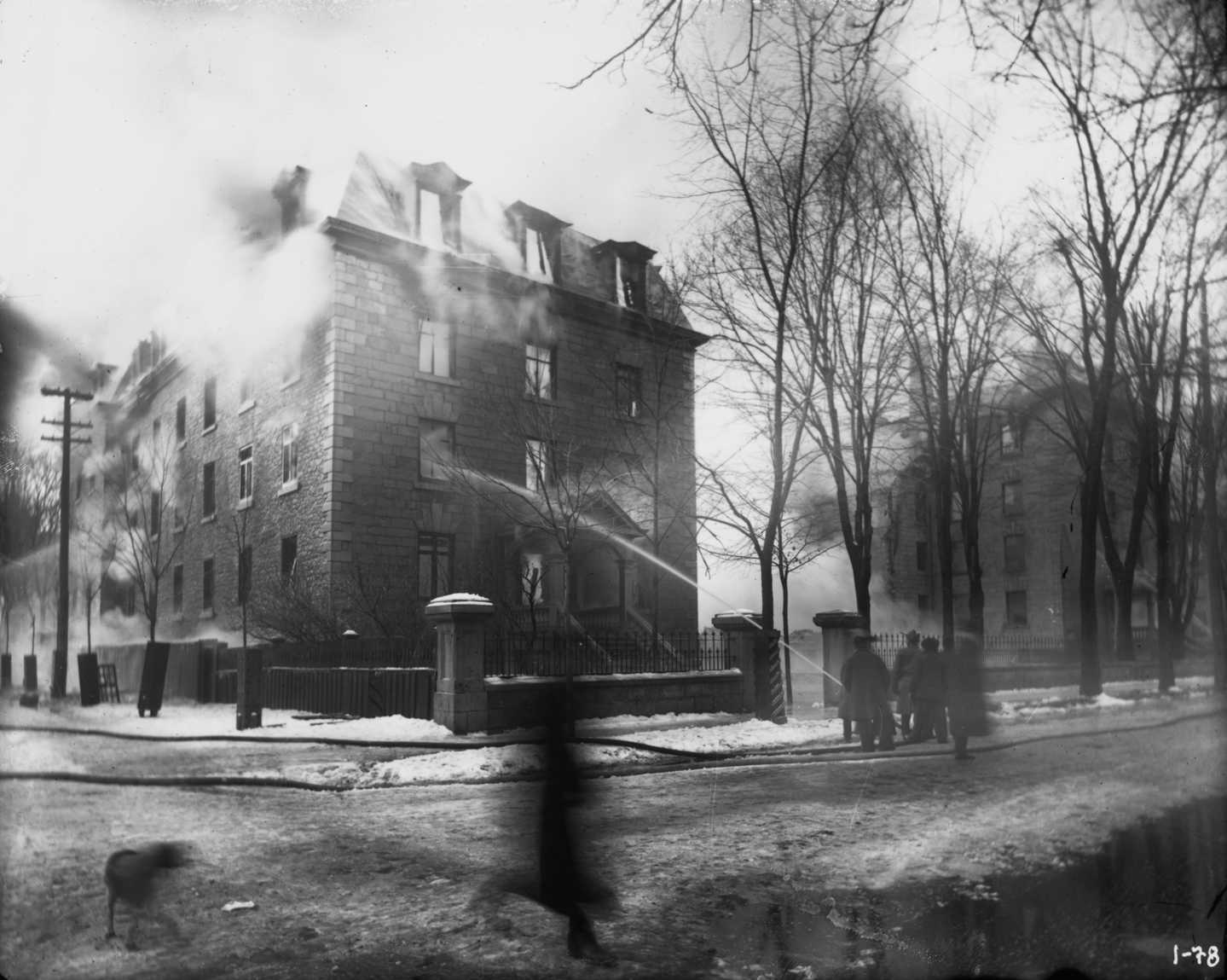 Photograph of the university's main building during the 1903 fire incident