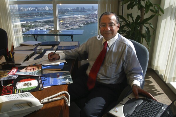 FILE - Manuel Rocha sits in his office at Steel Hector & Davis in Miami in January 2003, joining the firm to help open doors in Latin America. On Thursday, Feb. 29, 2024, Rocha, 73, told a judge he would admit to federal counts of conspiring to act as an agent of a foreign government, charges that could land him behind bars for several years. (Raul Rubiera/Miami Herald via AP, File)
