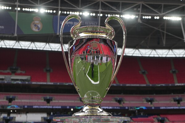 The UEFA Champions League trophy is on display before the training sessions ahead of the Champions League final soccer match between Borussia Dortmund and Real Madrid at Wembley Stadium in London, Friday, May 31, 2024. The final will be played on Saturday June 1, 2024. (AP Photo/Kirsty Wigglesworth)