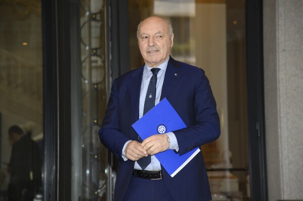 Giuseppe Marotta exits Palazzo Parigi after being appointed president of Inter Milan, in Milan, Italy, Tuesday, June 4, 2024. New Inter Milan owner Oaktree has named CEO Giuseppe Marotta as club president as the American fund begins its era in charge in earnest. (Claudio Furlan/LaPresse via AP)