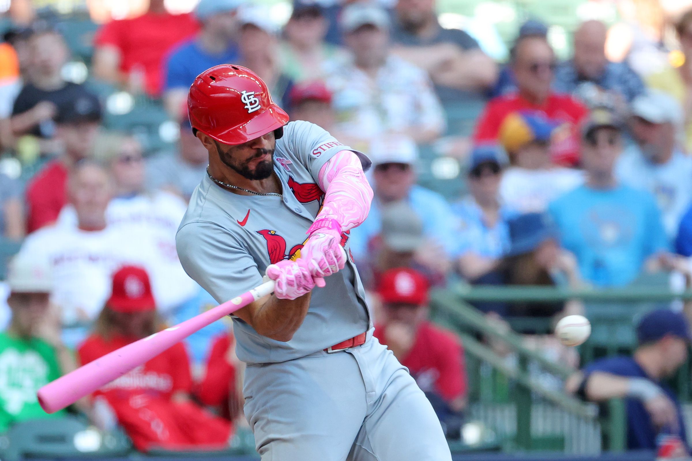 A photo showing Iván Herrera at bat during the St. Louis Cardinals vs Milwaukee Brewers game.