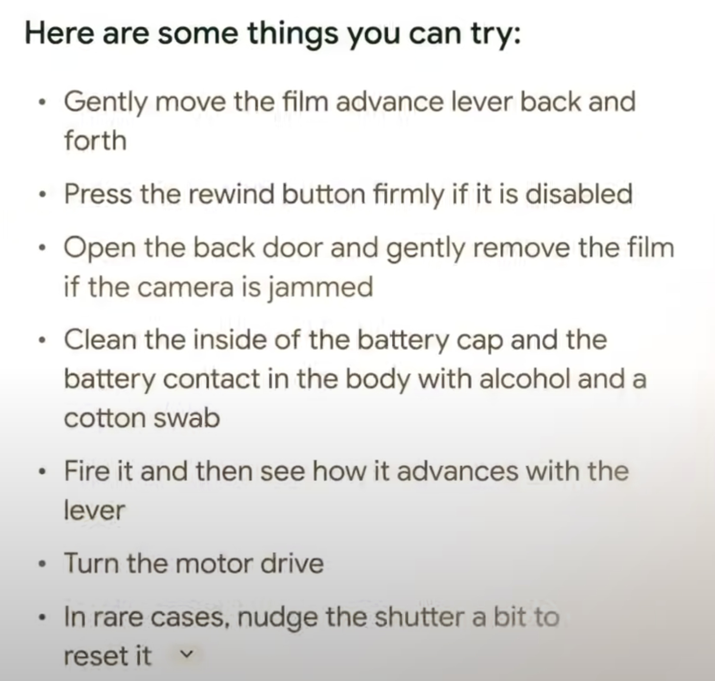 Google Gemini’s list of suggestions to fix a stuck film camera advance lever.