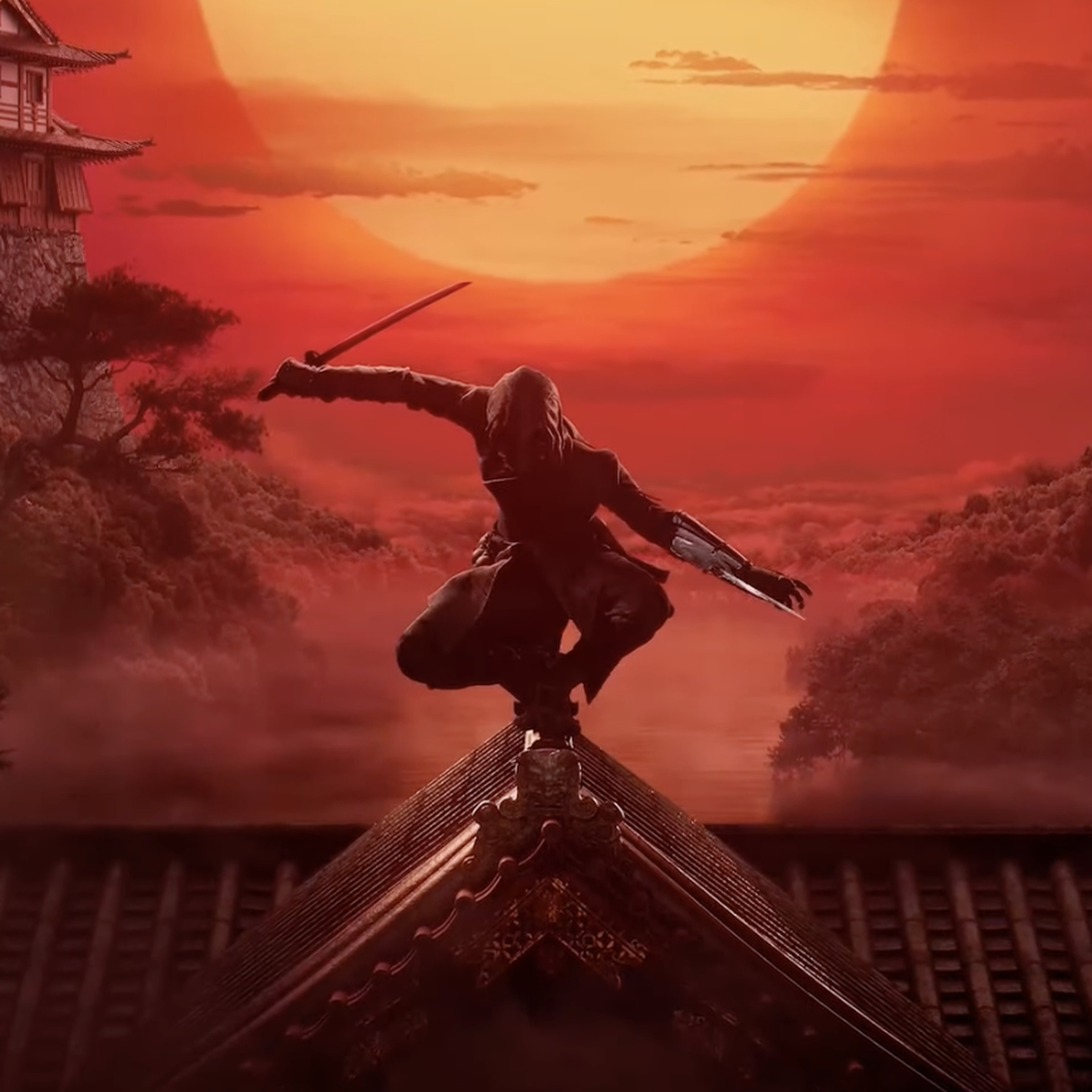 Key art from Ubisoft’s next Assassin’s Creed game, Assassin’s Creed Shadows featuring a ninja brandishing a sword and a hidden blade perched on a Japanese temple set against a red sky and blazing sun.