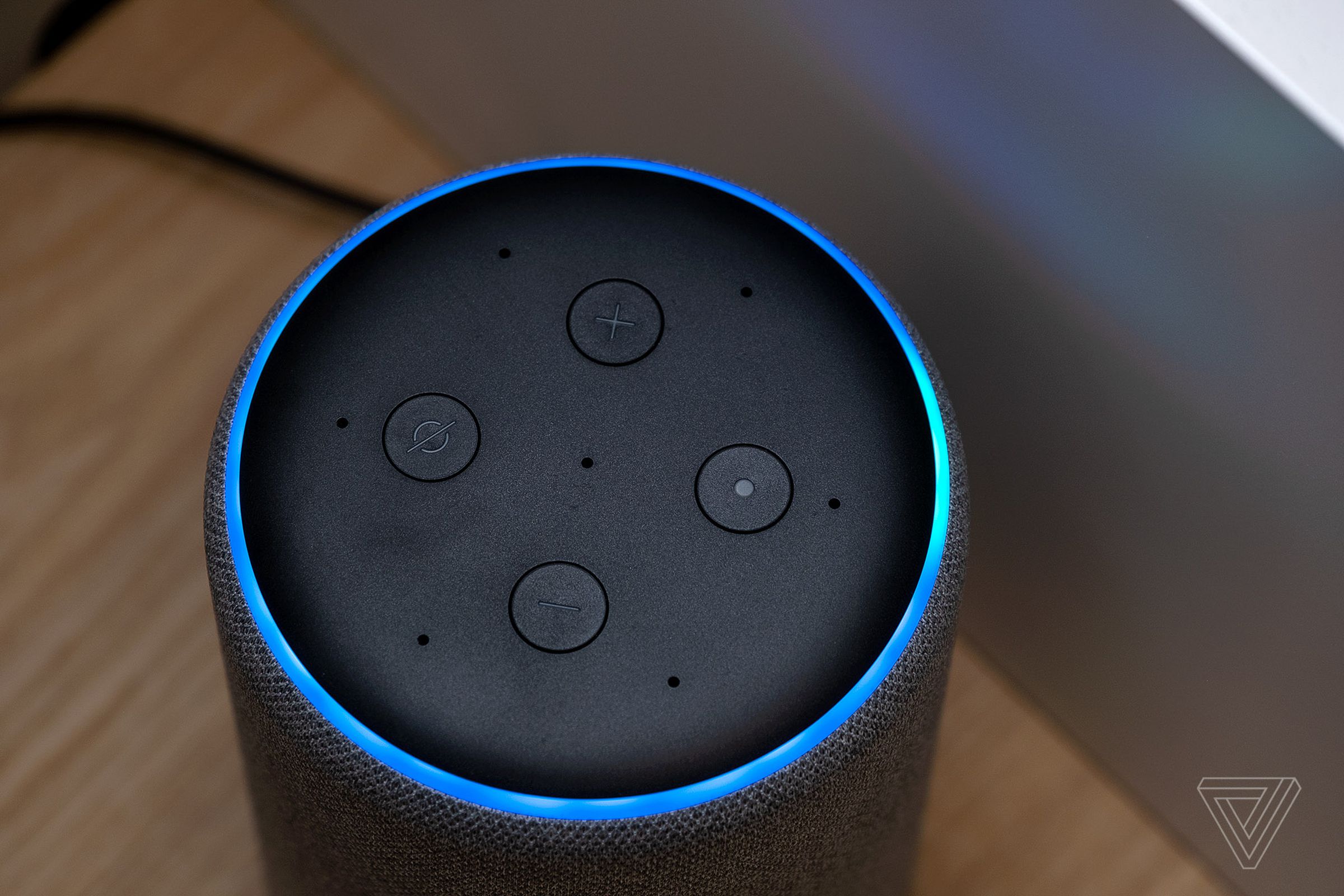 The seven mic array on the Echo is very good at picking up voice commands