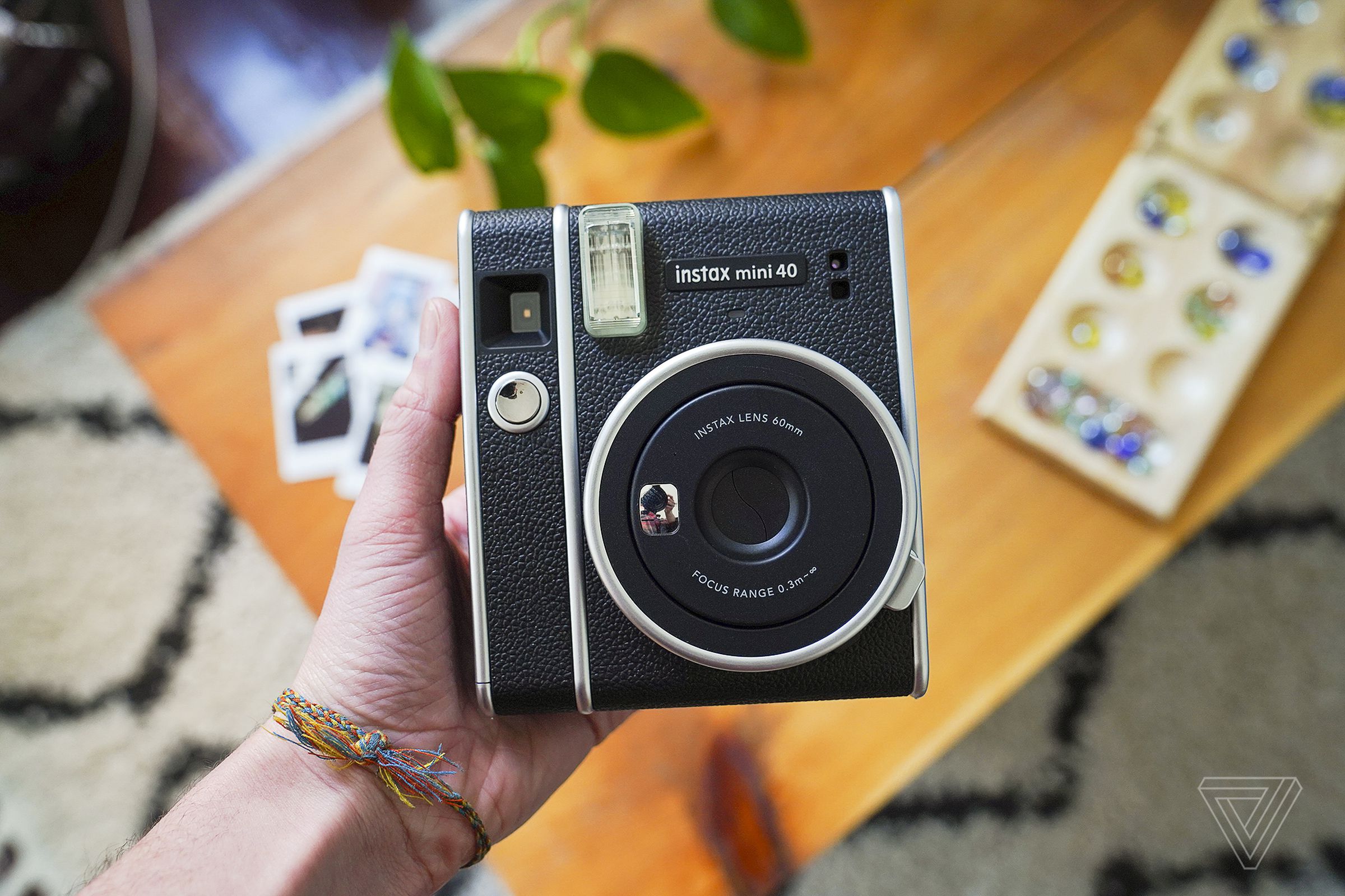The Instax Mini 40 is an entry-level instant film camera with only two settings and two buttons.