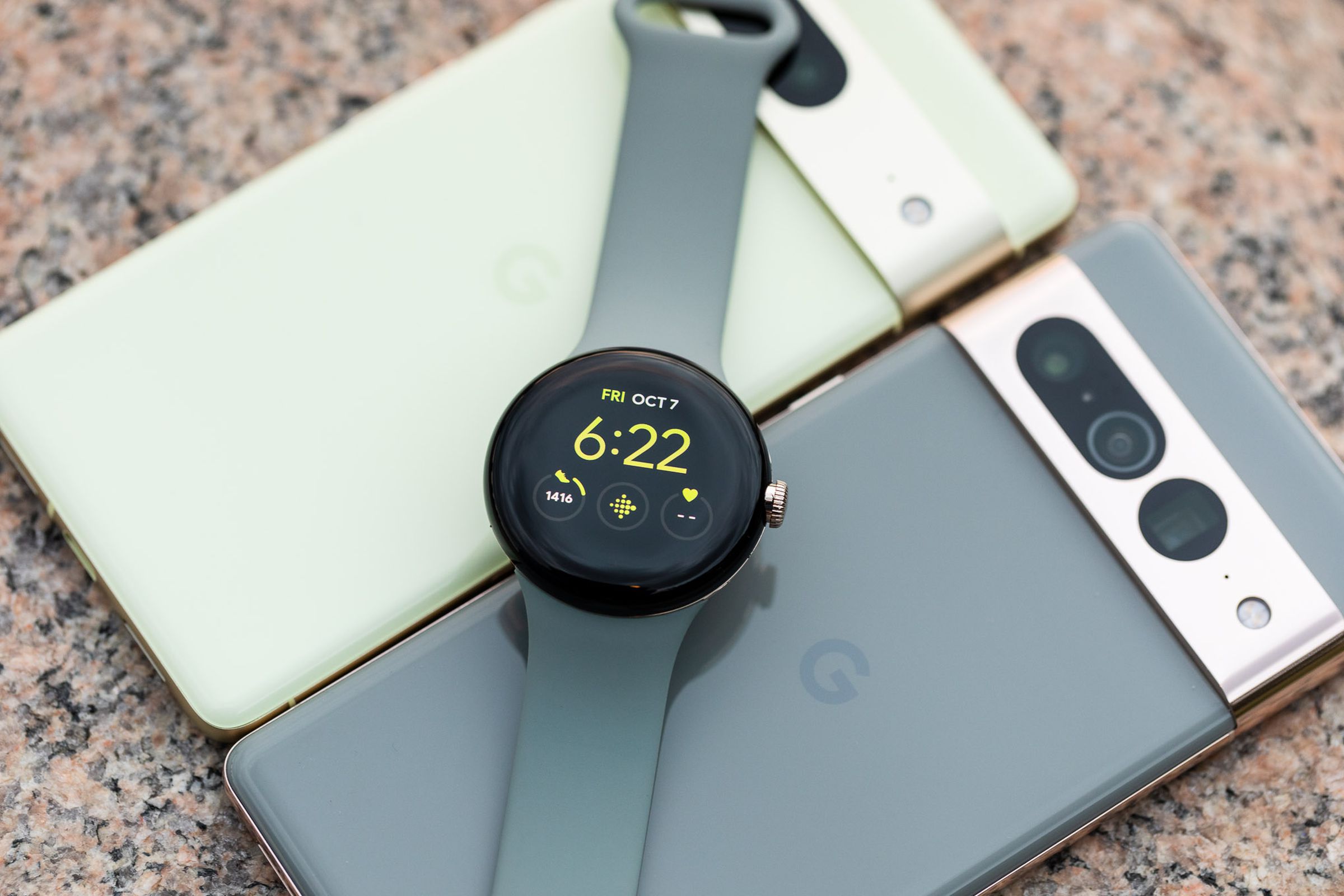 Pixel Watch on top of a Pixel 7 and Pixel 7 Pro