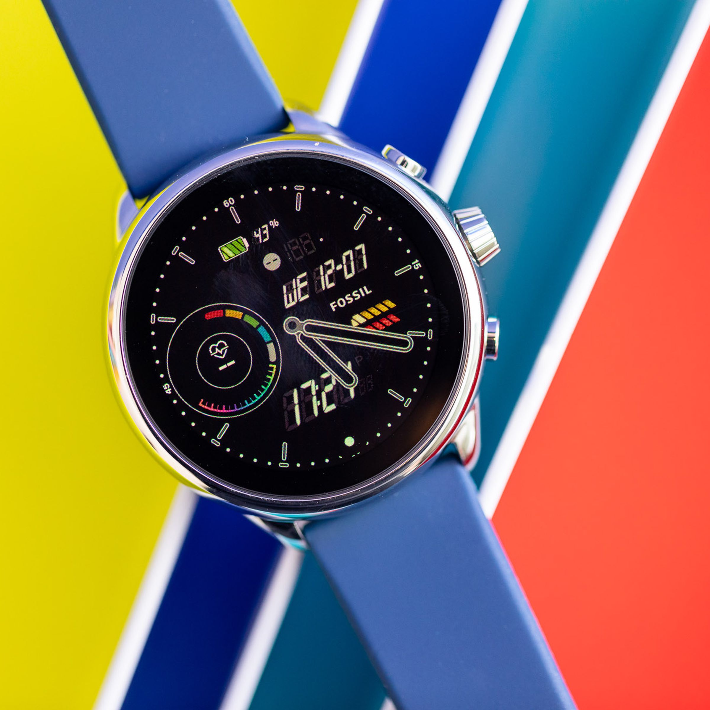 The Fossil Gen 6 Wellness Edition against a colorful background