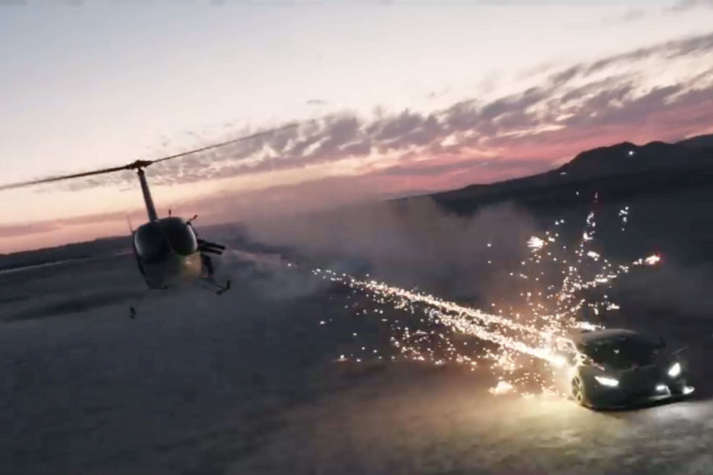 A screenshot from Alex Choi’s video showing a helicopter shooting fireworks at a Lamborghini.
