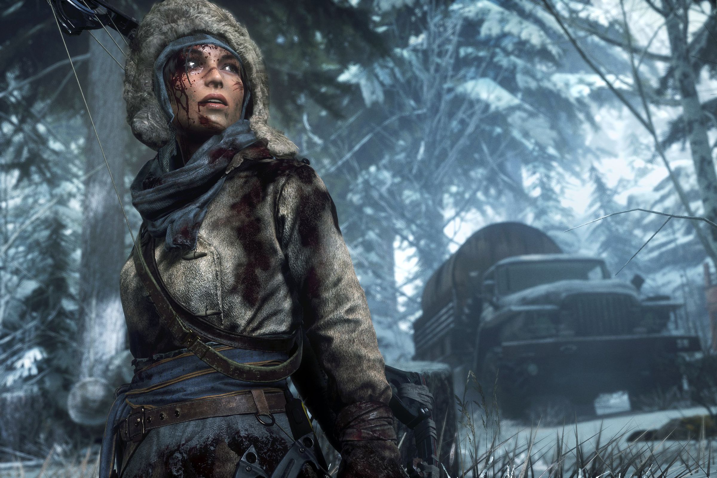 Screenshot from Rise of the Tomb Raider featuring Lara Croft covered in blood and bundled in a fur coat in a frozen wilderness