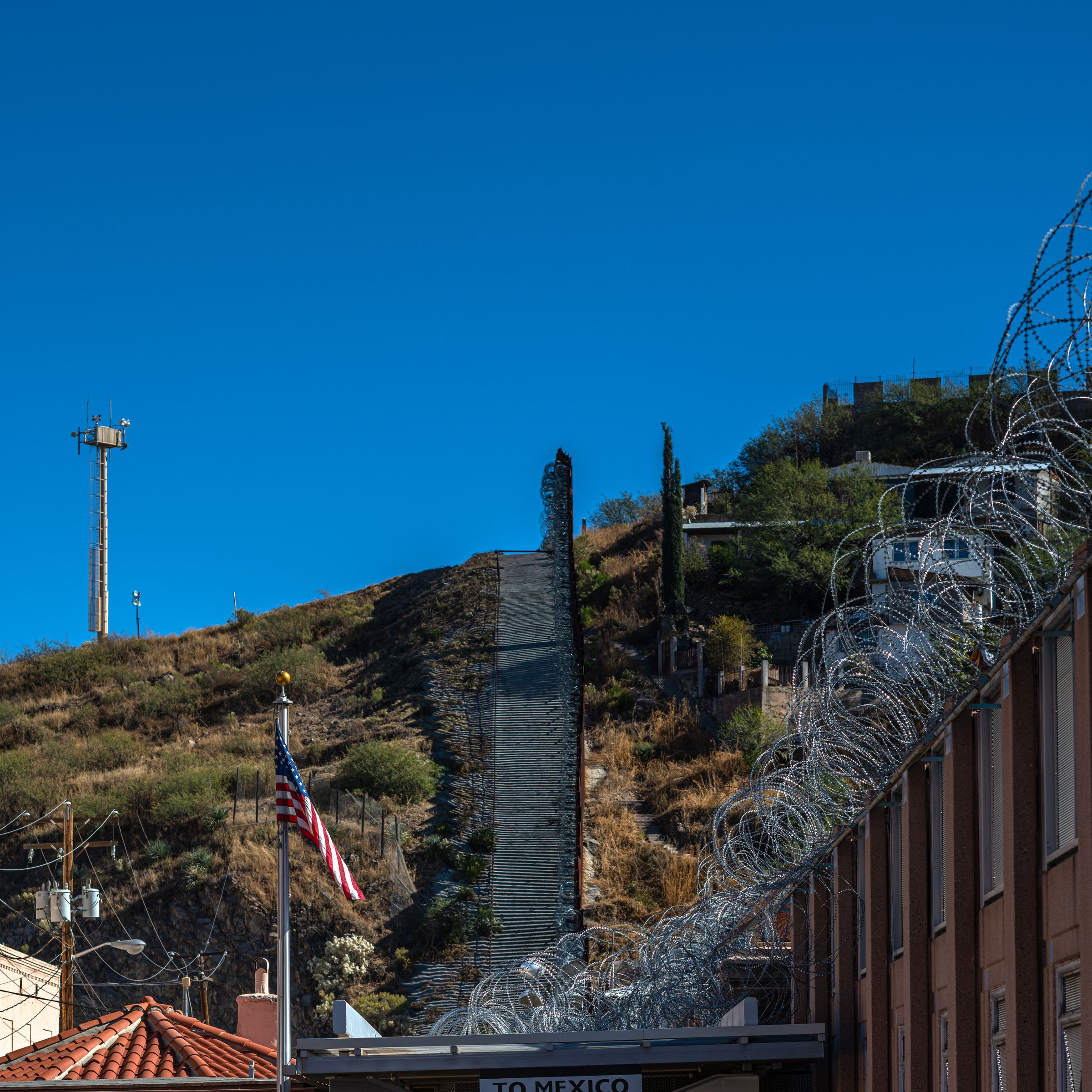 The border wall in Nogales, Ariz. has a number of anti-personnel features.