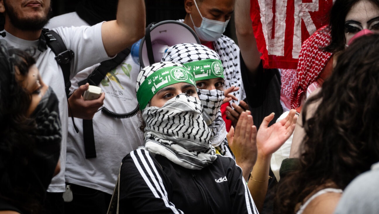 Protesters wearing Hamas headbands and masks at Baruch College in Manhattan, June 5, 2024. (Luke Tress)