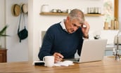 GettyImages-older man scratching head senior social security