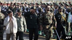 President Mahmud Ahmadinejad reviews Basij troops at a military base during Basij Week.