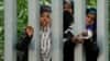 Migrants are blocked from entering Poland by metal barriers erected along the border with Belarus in the Bialowieza Forest on May 29.<br />
<br />
Poland says neighboring Belarus and its main supporter, Russia, are behind a surge in migrants from Belarus toward the European Union in a move to create a crisis.<br />
<br />
<br />
&nbsp;