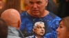 A Fidesz party supporter wears a T-shirt with a portrait of Hungarian Prime Minister Viktor Orban during the EU elections in Budapest on June 9. 