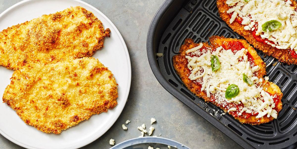 chicken parmesan cutlets with mozzarella cheese on top