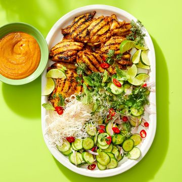 grilled chicken with sunflower seed satay sauce and a cucumber salad