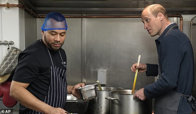 William gets stuck in as he helps make bolognaise sauce with head chef Mario Confait