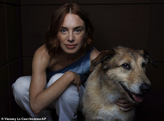 Writer Laetitia Dosch poses with rescue dog Kodi who plays Cosmos in Dog On Trial
