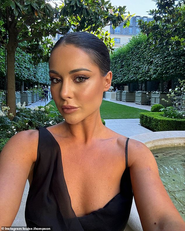 She paired the dress with a sleek updo and a face of glowy makeup as she posed for an array of pictures in the iconic garden