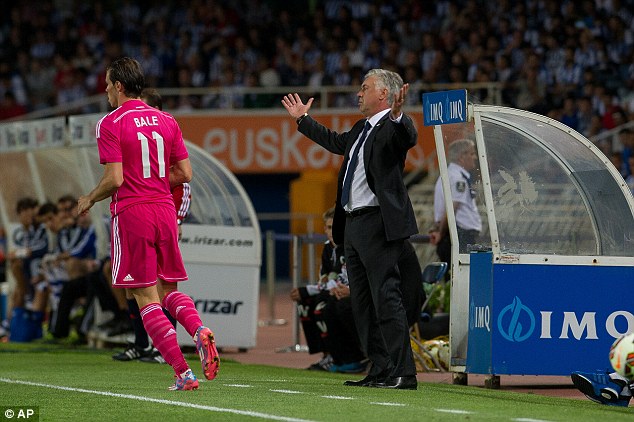 Bad start: Carlo Ancelotti's (right) side were beaten 4-2 by Real Sociedad last Sunday