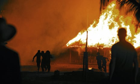 Huts are set alight for the climactic moment of First They Killed My Father.