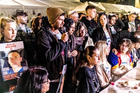 The families of Israeli hostages hold a Shabbat meal together at the Hostages Square, Tel Aviv, marking 20 empty Friday night dinners as their loved ones remain in Hamas captivity in Gaza.