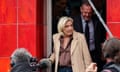French far-right Rassemblement National (RN) party leader Marine Le Pen (c).