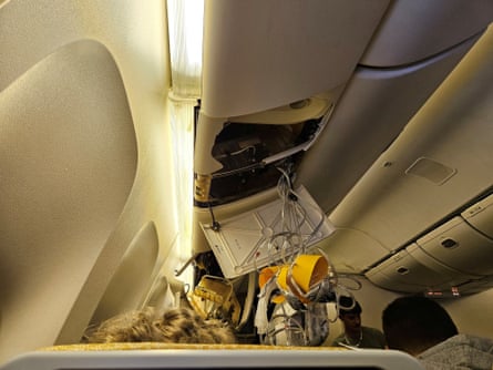 The interior of Singapore Airline flight SQ321 after it hit severe turbulence.