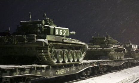 Russian tanks loaded on to rail platforms