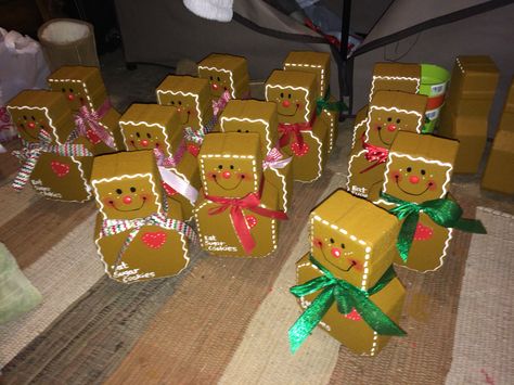Gingerbread men pavers. Easy to make for the holidays. Just time consuming Gingerbread Gift Wrapping Ideas, Gingerbread Wrapping Ideas, Cane Decorations, Christmas Candy Cane Decorations, Christmas Packages, Gingerbread Gifts, Candy Cane Decorations, Gingerbread Decor, Christmas Delights