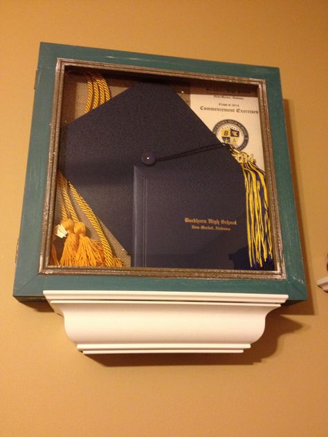Found a perfect shadow at Home Goods for $16.99 that fits all my graduation goodies in it to display in my room! ...Instead of putting it in a box in the top of my closet! Jrotc Shadow Box Ideas, Graduation Cap Display, High School Graduation Shadow Box Ideas, Graduation Frame Display, Diploma Display Ideas, Cap And Gown Shadow Box Ideas, Graduation Shadow Box Ideas High School, Graduation Shadow Box Ideas, Graduation Shadow