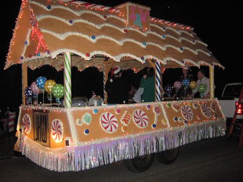 Our Christmas Parade Float - the Gingerbread House. Giant Gingerbread House. Large Candy. Natal, Gingerbread House Float Ideas, Holiday Parade Floats, Parade Float Diy, Parade Float Theme, Giant Gingerbread House, Christmas Floats, Parade Float Ideas, Parade Float Decorations