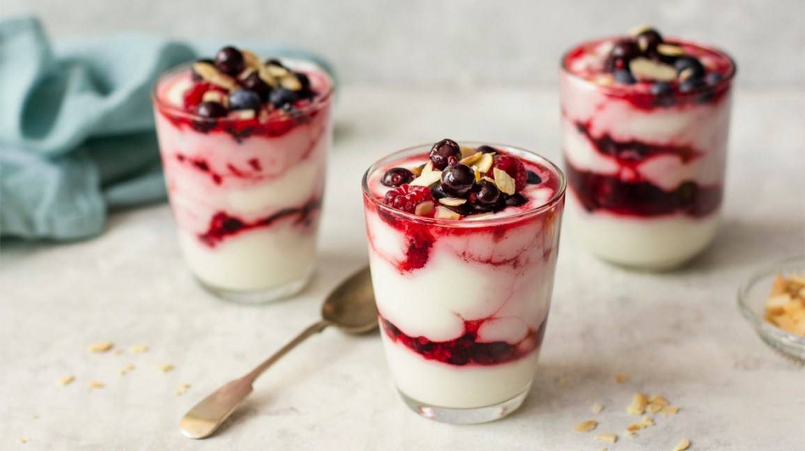 three glasses of yogurt and fruit