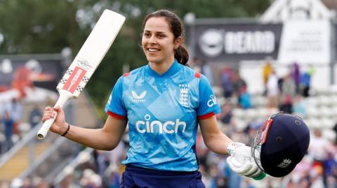 England's Maia Bouchier celebrates hitting a century against New Zealand