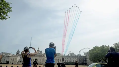 PA Media The Red Arrows flew over Horse Guards Parade