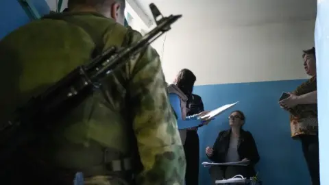 Getty Images Voting in Donetsk, 23 September