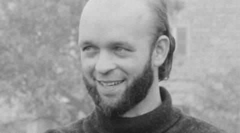 Michael Eavis in black and white in the 1970s describing the first Glastonbury