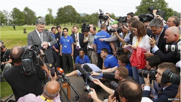 Ukraine's President Petro Poroshenko speaks to the media at the Nato summit