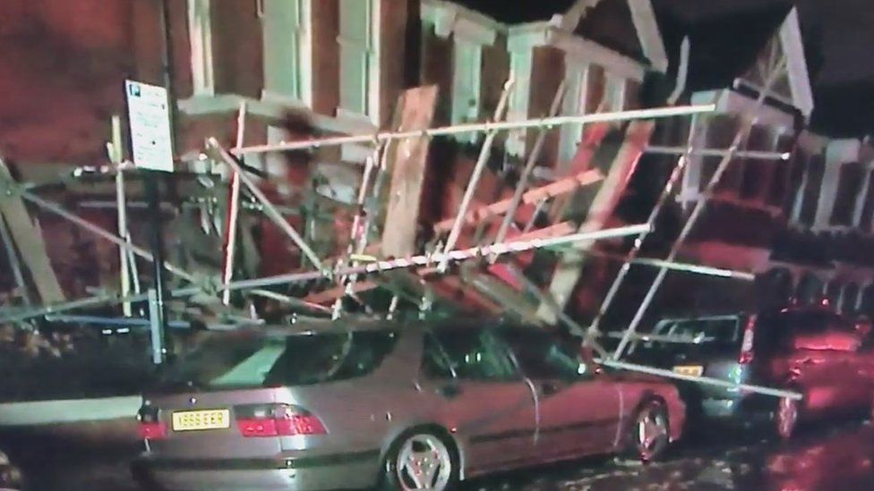 Scaffolding on top of a car in Brighton