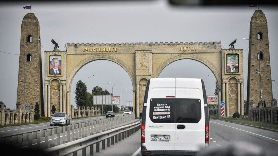 A road arch with portraits of Vladimir Putin and Akhmad Kadyrov, father of current Chechen leader Ramzan Kadyrov, in Grozny