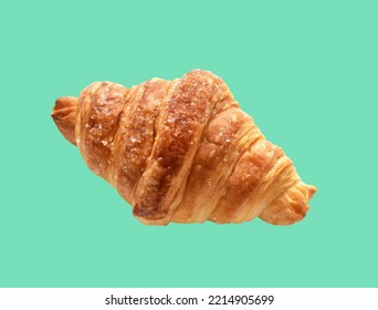 Cheese croissant isolated in green background with clipping path, no shadow, homemade dessert