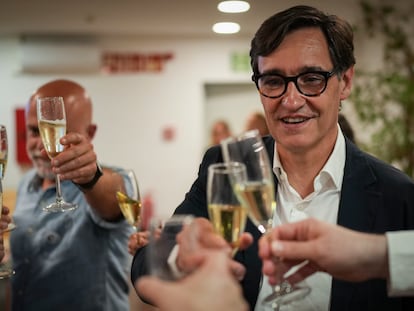 Socialist candidate Salvador Illa makes a toast with his members of his team and party colleagues after the announcement of the results of the elections to the Catalan parliament in Barcelona, Sunday May 12, 2024. The Socialists led by former health minister Illa won a majority of 42 seats, up from their 33 seats in 2021 when they also barely won the most votes but were unable to form a government. They will still need to earn the backing of other parties to put Illa in charge.(AP Photo/Emilio Morenatti)