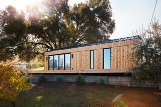 One of the first Dwell Houses, built by Abodu, was installed at Leslie Scharf’s vineyard home in Healdsburg, California. Norm Architects led the design of the 540-square-foot prefab, which is wrapped in Real Cedar siding.
