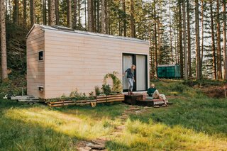 Datscha, the 194-square-foot cabin that Anna and Jakob Busch built with the help of family and friends, is clad with spruce siding and capped with a standing-seam metal roof.