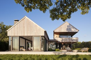 East Lake House, designed by Robert Young Architects, features two structures to capture sunshine and breezes from all angles.