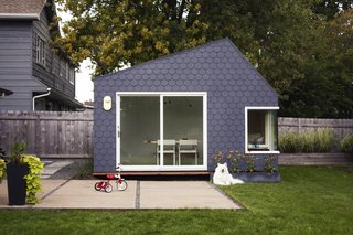 This 195-square-foot, shingled studio includes a library, reading nook, and workstation—and it’s totally DIY. Creative couple Michael and Christina Hara built the retreat just steps away from their back door, in order to carve out "space for creativity and respite from our chaotic, toddler-filled house," as Michael explains. The project, called the Fish Scale Studio, took eight months to complete, with Haras doing all of the design and construction themselves—for just $18,275.
