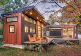 Outdoor, Trees, Small Patio, Porch, Deck, Back Yard, and Wood Patio, Porch, Deck "Amplified" Tiny House -  Brazilian Abaco hardwood and corrugated metal siding  Photo 1 of 18 in Amplified Tiny House by Asha Mevlana